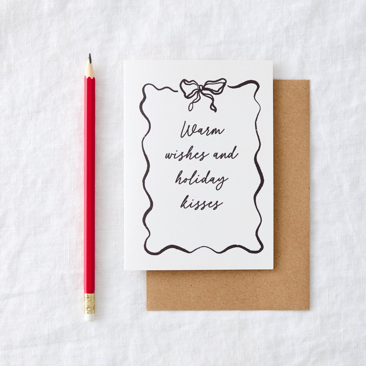 Warm wishes and holiday kisses Bow Christmas Card